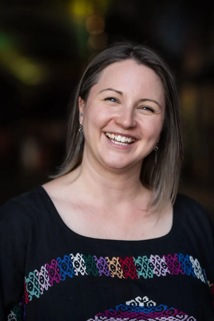 Georgie Sears laughing, a warm and down-to-earth coach for creatives